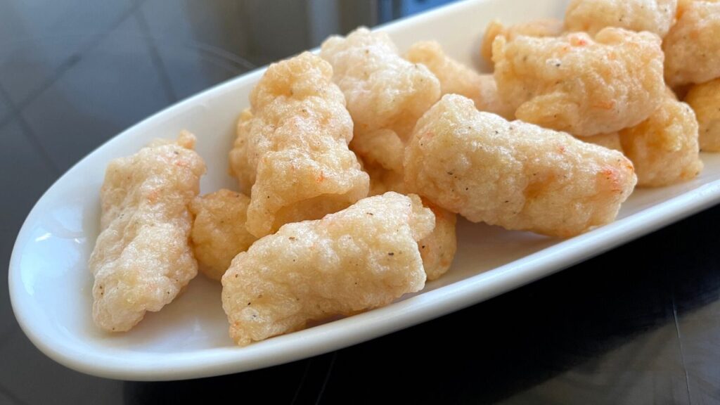 bite sized Prawn appetizers served in a white long dish