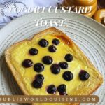 Custard Yogurt Toast with blueberries served in a grey plate