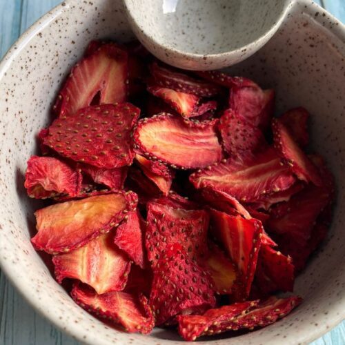 A bowl of freshly made Air Fryer Dehydrated Strawberry Chips