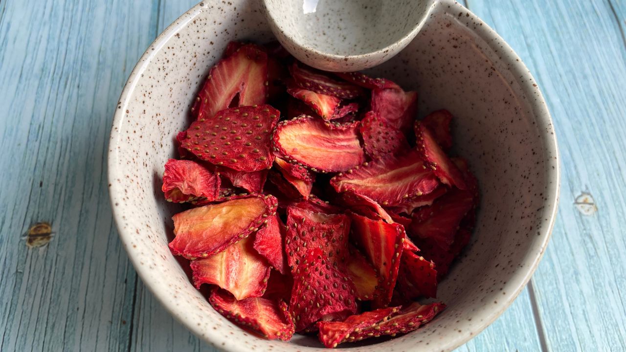 A bowl of freshly made Air Fryer Dehydrated Strawberry Chips