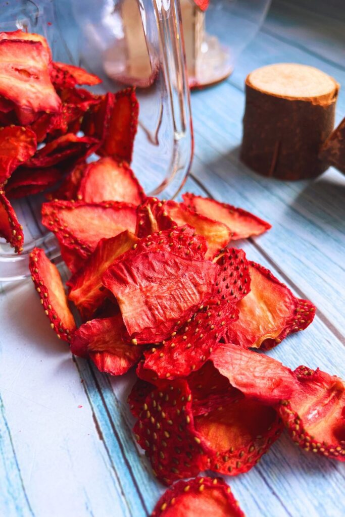 a pile of air fryer dried strawberry chips snacks