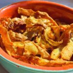 Freshly Made Crispy Golden Air Fryer Potato Fries Served In A Bowl