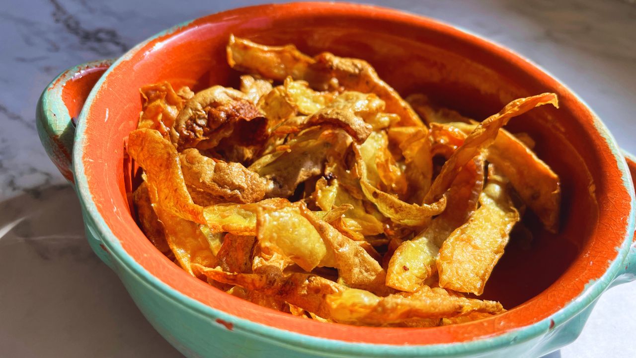 Freshly Made Crispy Golden Air Fryer Potato Fries Served In A Bowl