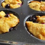 Freshly made Blueberry French Toast Cups in a muffin pan