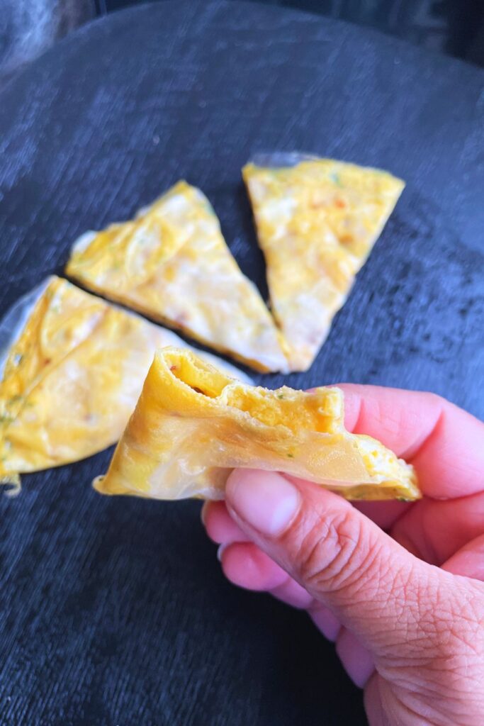 close up picture of Vietnamese Rice Paper Omlette  cut into wedges