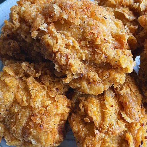 freshly fried Crispy fried chicken served on a plate.