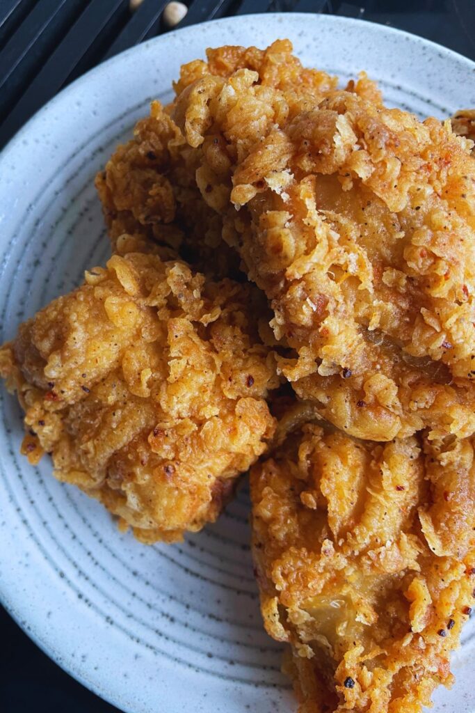 Fried Chicken Recipe served on a grey plate