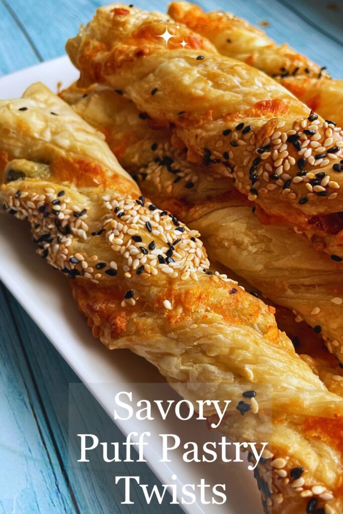 Freshly baked Savory Puff Pastry Twists on a plate 