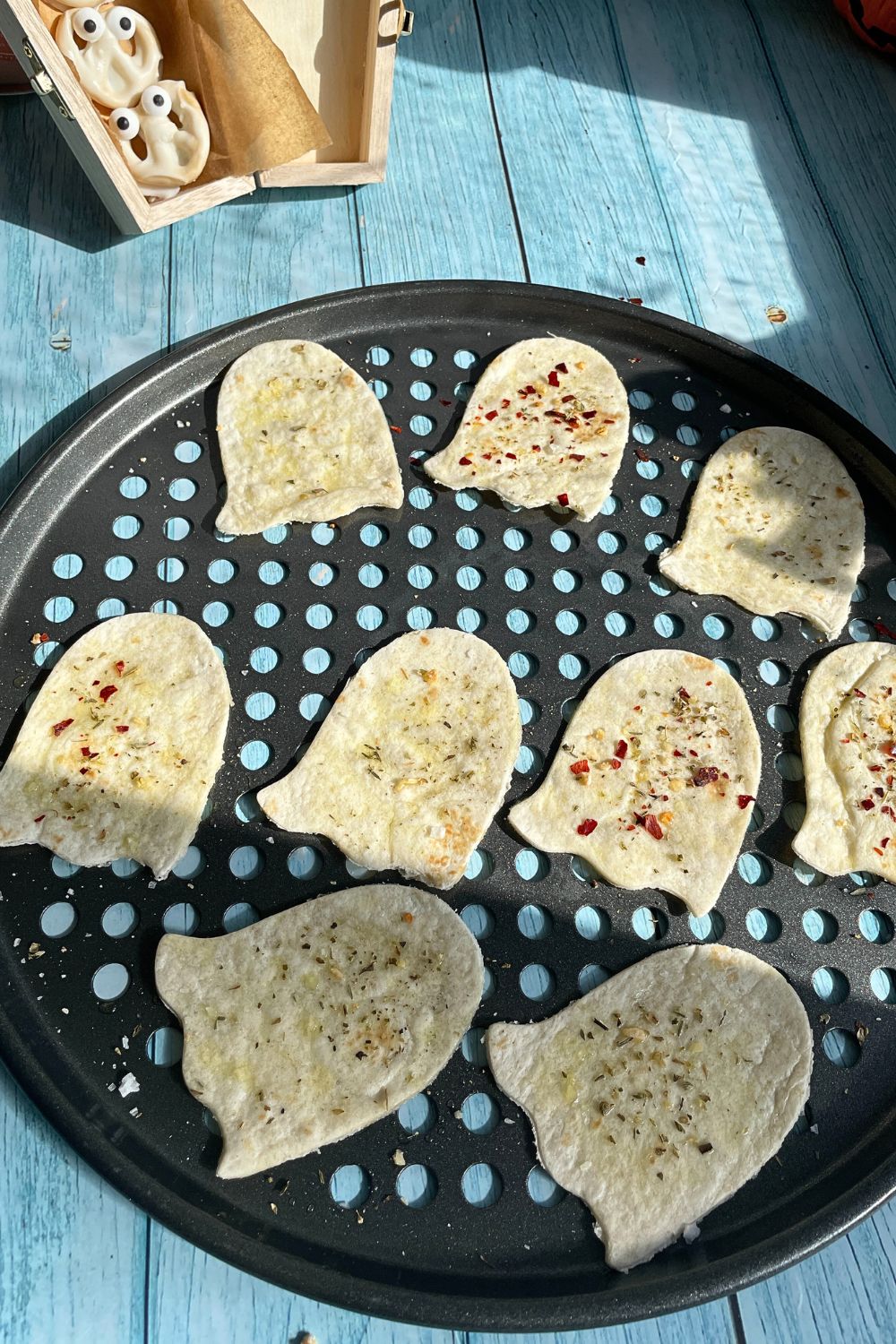 How to make Halloween Ghost Chips With Tortilla on a tray