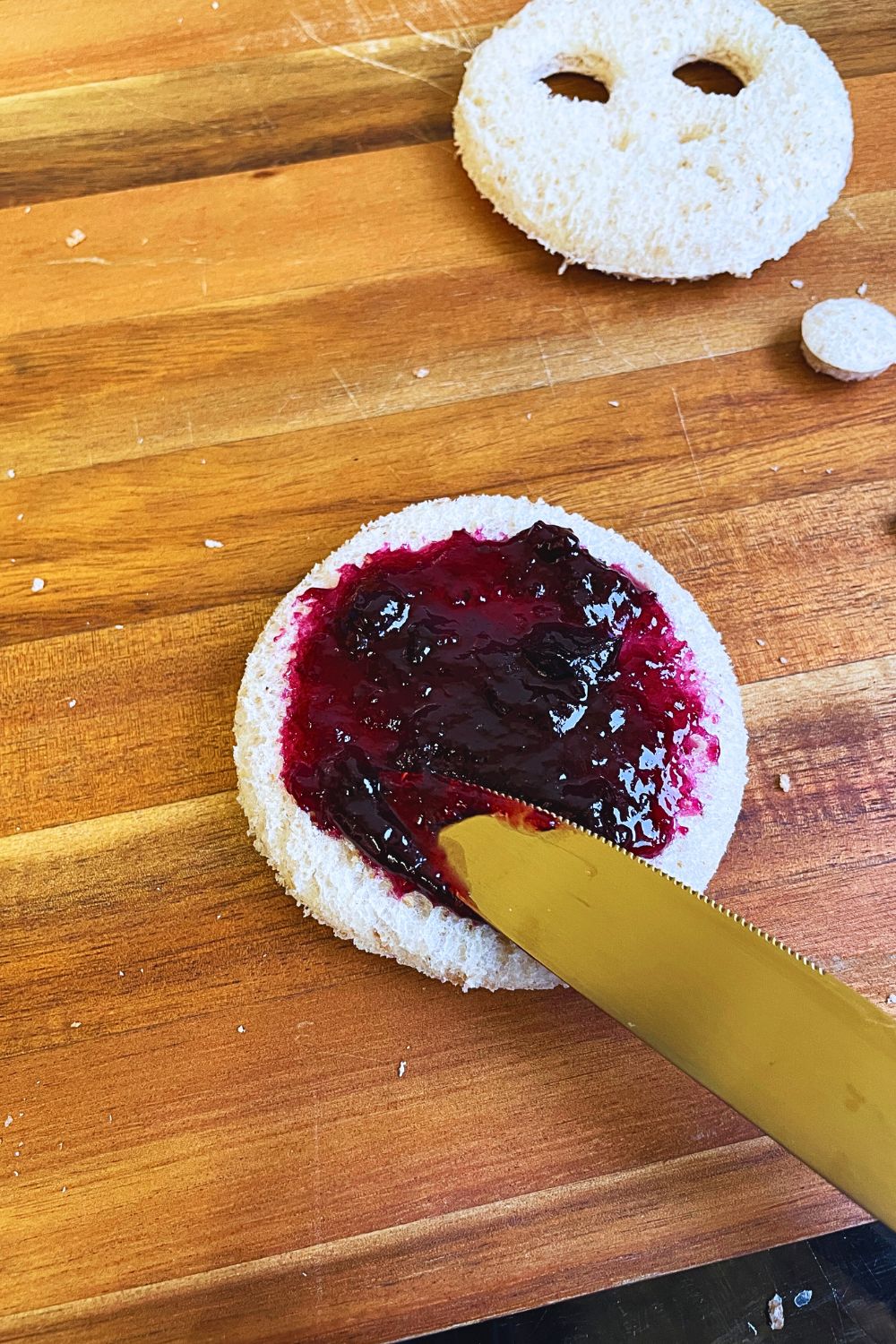 Apply jam on one slice